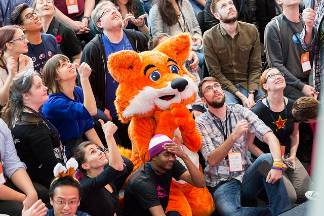 Group of visitors with Mozilla fox at MozFest 2015